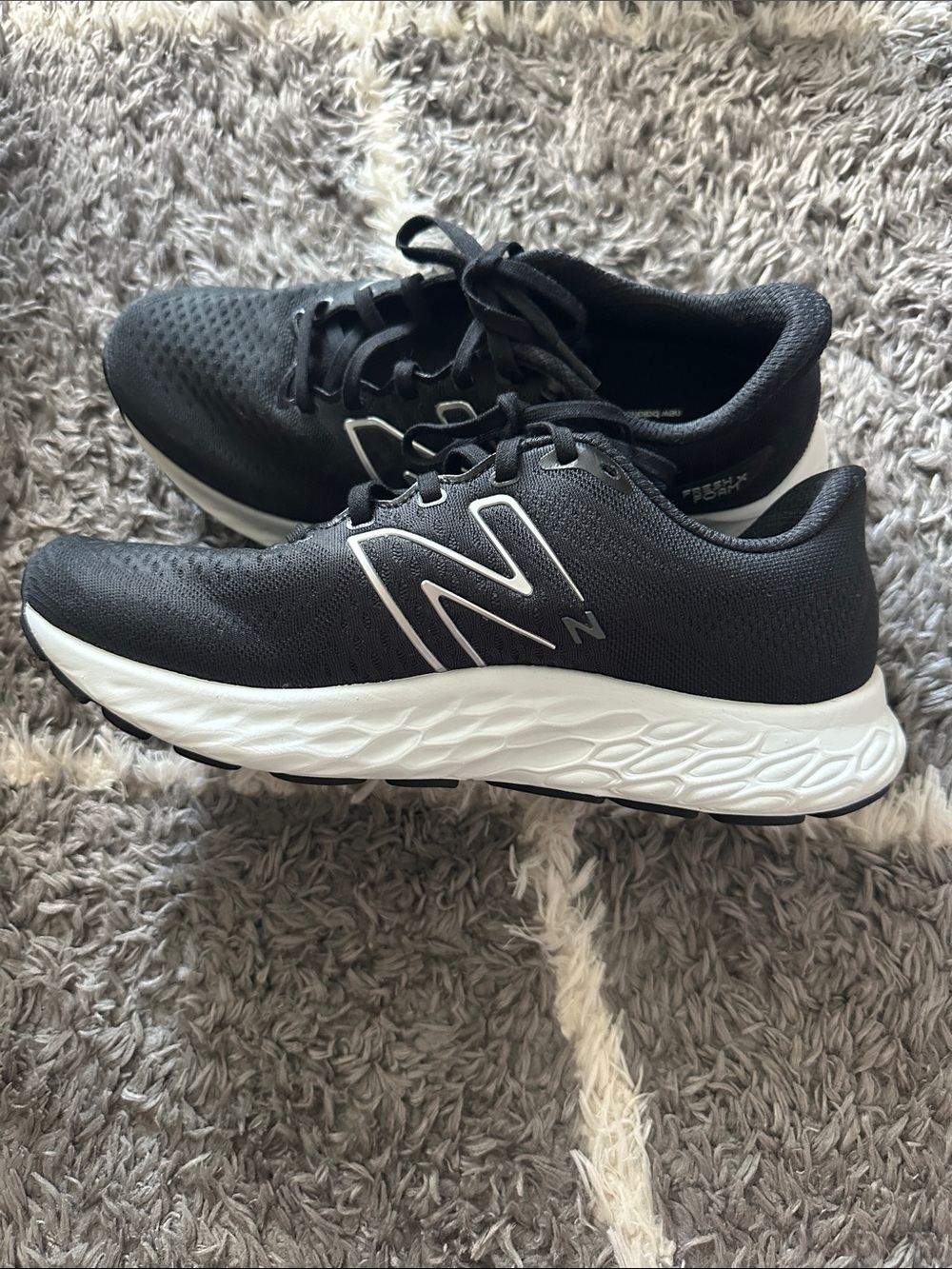 New Balance Black Running Shoes with White Sole